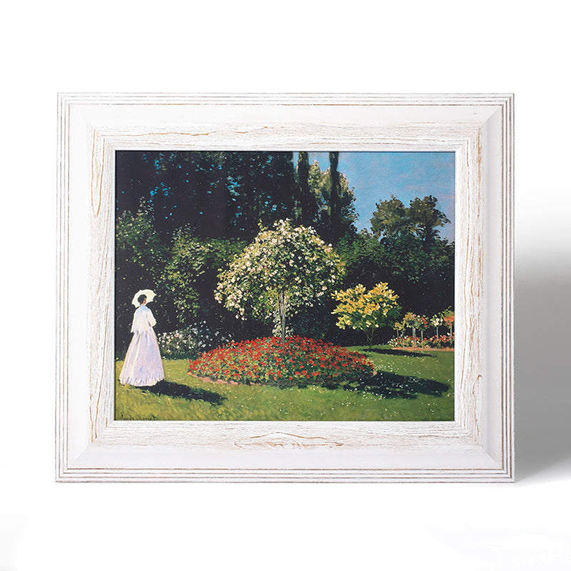Woman in the Garden by Claude Monet (Canvas Print with White Frame)